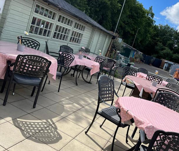 Outdoor tables on the terrace at Bonnie's Café